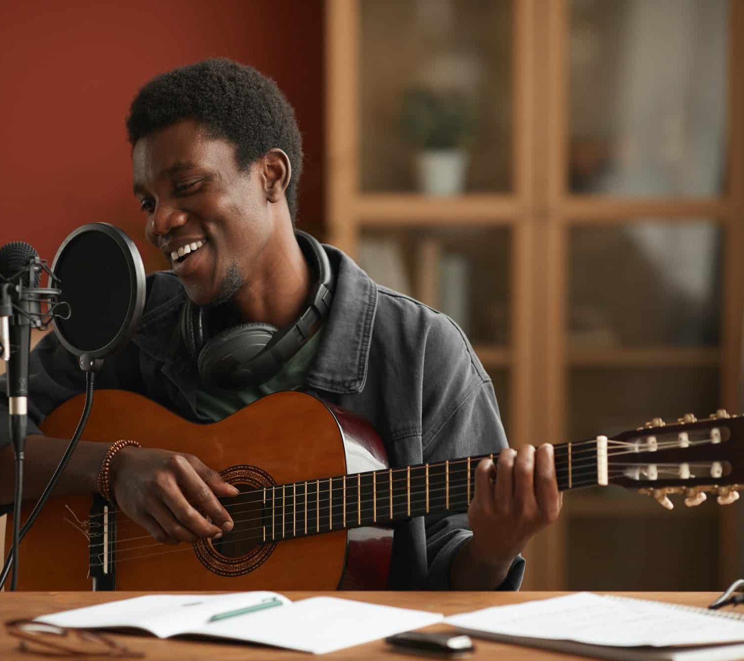Talented African-American Man Singing at Home